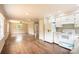 Open floor plan with living room flowing into the kitchen area, showcasing modern design elements at 462 Berry Hill Dr, Norwood, NC 28128