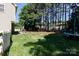 Spacious backyard features a lush lawn, mature trees, and a trampoline at 4642 Laurendale Ct, Rock Hill, SC 29732