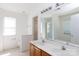Bright bathroom with double sinks, tub, and shower, with lots of natural light at 4642 Laurendale Ct, Rock Hill, SC 29732
