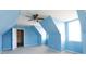 Expansive bedroom with sloped ceilings is painted a tranquil blue, filled with natural light at 4642 Laurendale Ct, Rock Hill, SC 29732