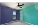 Colorful bedroom with a ceiling fan and light coming in from a window at 4642 Laurendale Ct, Rock Hill, SC 29732