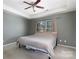 Bedroom with a neutral color scheme, ceiling fan and lots of natural light at 4642 Laurendale Ct, Rock Hill, SC 29732