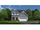 Charming two-story home featuring a mix of siding, stone accents, well-manicured lawn, and a two-car garage at 518 Durango Way, Denver, NC 28037