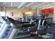 Modern gym with various exercise machines including treadmills and stationary bikes for residents at 518 Durango Way, Denver, NC 28037