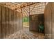 Spacious barn interior featuring wood construction, hay storage, and ample light at 536 Brookhaven Rd, Statesville, NC 28625