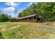 Spacious barn structure offering versatile storage solutions or potential for livestock housing on the property at 536 Brookhaven Rd, Statesville, NC 28625