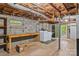 Unfinished basement area with laundry facilities and work space at 536 Brookhaven Rd, Statesville, NC 28625