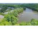 High aerial view captures the waterway and private boat docks located near this community at 5727 Lavaux Ct, Charlotte, NC 28214