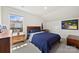 Comfortable bedroom with carpet, a natural light, and casual furnishings creates a relaxing atmosphere at 5727 Lavaux Ct, Charlotte, NC 28214