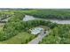 Aerial view reveals a community pool, playground, and green space for residents at 5727 Lavaux Ct, Charlotte, NC 28214