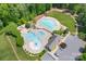Aerial view shows a neighborhood pool and recreational center offering plenty of options at 5727 Lavaux Ct, Charlotte, NC 28214
