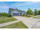 Well-maintained one-story home with landscaped front yard, driveway, and manicured lawn at 5727 Lavaux Ct, Charlotte, NC 28214