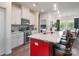 Well-equipped kitchen features a large island, stainless steel appliances, and modern finishes at 5727 Lavaux Ct, Charlotte, NC 28214