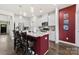 Modern kitchen featuring white cabinets, gray countertops, a kitchen island, and stainless steel appliances at 5727 Lavaux Ct, Charlotte, NC 28214