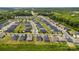 A high aerial view displays the home's neighborhood amongst a well-landscaped community at 5727 Lavaux Ct, Charlotte, NC 28214