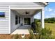 The home features an outdoor covered patio with ceiling fan and ample space for outdoor dining at 5727 Lavaux Ct, Charlotte, NC 28214