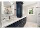 Beautiful bathroom with dual sink vanity and tower storage cabinet at 6040 Morris Farm Ln, Mint Hill, NC 28227