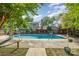 Enjoy this in-ground pool, surrounded by mature trees, ready for summer relaxation and fun at 6040 Morris Farm Ln, Mint Hill, NC 28227