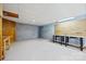 Unfinished basement with cinderblock walls and workbench, great for storage or a workshop at 7103 Forest Ridge Rd, Matthews, NC 28104