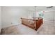 Upstairs landing with wood railing, carpeted floors, and neutral decor at 7103 Forest Ridge Rd, Matthews, NC 28104