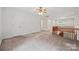 Upstairs loft area features neutral colors and natural light at 7103 Forest Ridge Rd, Matthews, NC 28104