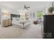 Bright main bedroom with a ceiling fan at 7103 Forest Ridge Rd, Matthews, NC 28104