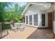 Relaxing patio with outdoor seating and great views of the backyard at 7103 Forest Ridge Rd, Matthews, NC 28104
