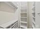 Walk-in closet features ample shelving for optimal storage at 7103 Forest Ridge Rd, Matthews, NC 28104