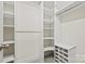 Walk-in closet provides ample shelving and organization space at 7103 Forest Ridge Rd, Matthews, NC 28104