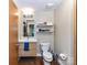 Modern bathroom with a stylish vanity, sleek fixtures, and ample storage at 715 N Church St # 213, Charlotte, NC 28202