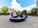 Outdoor sculpture creates a focal point for the condominium's residents and guests at 715 N Church St # 213, Charlotte, NC 28202