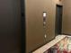 Condo elevators feature wall decor and tile flooring at 715 N Church St # 213, Charlotte, NC 28202