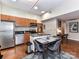 Bright kitchen features stainless steel appliances, granite countertops, and a functional center island at 715 N Church St # 213, Charlotte, NC 28202