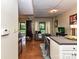 Modern condo interior featuring an open-concept living area with large windows and neutral tones at 715 N Church St # 213, Charlotte, NC 28202