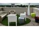 Serene rooftop deck with outdoor seating and city views at 715 N Church St # 213, Charlotte, NC 28202