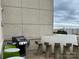 Outdoor grill and bar area with outdoor seating at 715 N Church St # 213, Charlotte, NC 28202