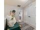 Cozy hallway with decor, leading to a bedroom with an open closet at 7341 Adare Mews Rd, Charlotte, NC 28217