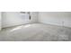 Spacious bedroom with plush carpeting and plenty of natural light at 9948 Manor Vista Trl, Kannapolis, NC 28027