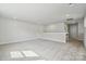 Bright bonus room with plush carpet, recessed lighting, and neutral paint at 9948 Manor Vista Trl, Kannapolis, NC 28027