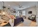 Bright bedroom with gallery wall, neutral tones, and stylish furniture at 1020 Forbishire Dr, Matthews, NC 28104