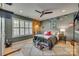 Charming bedroom with baseball decor, wood accent wall, and plush rug at 1020 Forbishire Dr, Matthews, NC 28104