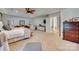 Bright main bedroom with a sitting area, a large dresser, and an ensuite bathroom for added convenience at 1020 Forbishire Dr, Matthews, NC 28104