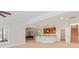 Finished basement with a pool table, bar with pendant lights and staircase access at 104 Whiterock Dr, Mount Holly, NC 28120