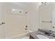 Full bathroom with a shower-tub combo and vanity with granite countertop; well-lit and functional at 104 Whiterock Dr, Mount Holly, NC 28120