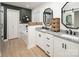 Stylish bathroom with double vanities, granite countertop, and decorative mirrors at 105 Chippewa Trl, China Grove, NC 28023