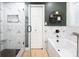 Modern bathroom features patterned tiles, glass shower and soaking tub at 105 Chippewa Trl, China Grove, NC 28023
