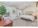 Bright bedroom with carpet, a vaulted ceiling, and ample natural light at 10617 Fuller Ridge Cir, Charlotte, NC 28270