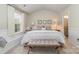Bedroom with carpet, a vaulted ceiling, and ample natural light from a large window at 10617 Fuller Ridge Cir, Charlotte, NC 28270