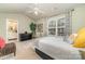 Bedroom with ceiling fan, carpet, and lots of light coming from a window at 10617 Fuller Ridge Cir, Charlotte, NC 28270