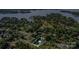 Aerial view of a property with a private backyard pool in a lakeside neighborhood at 113 Marina Ln, Mooresville, NC 28117